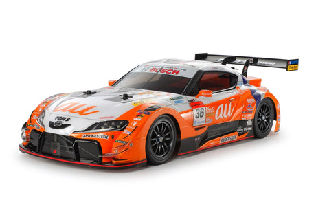Tamiya TT-02 RC Toyota Supra Tom's GR model kit with detailed chassis and body parts for remote control racing.