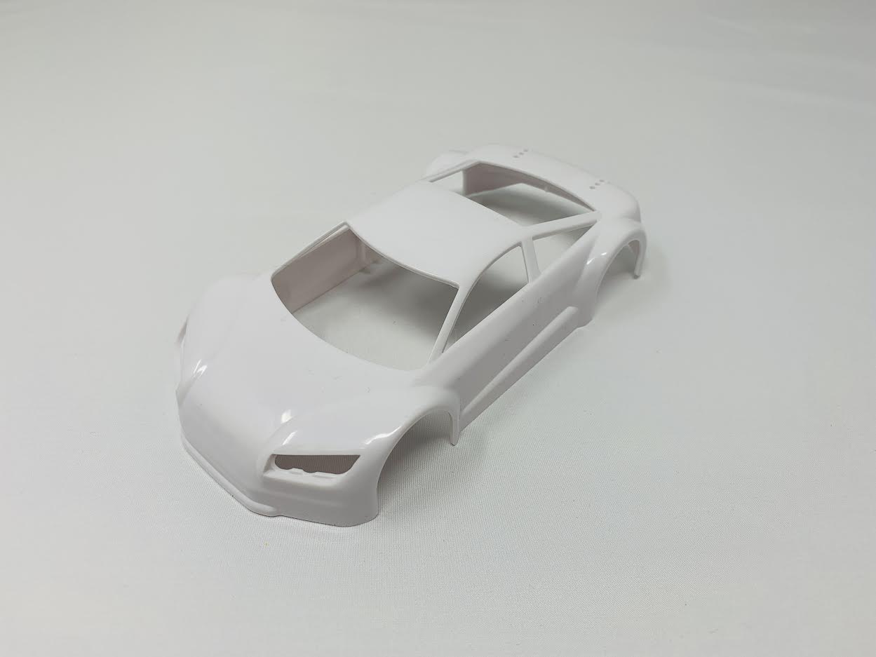 White Jomurema GT01 car body set with detailed panels and aerodynamic design for enhanced performance and style.