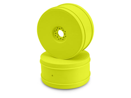 Set of four yellow JConcepts Bullet 1/8th buggy RC car wheels with detailed tread pattern on a white background.
