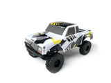 Black and yellow Element RC Enduro24 Sendero 1/24 RTR crawler with detailed chassis and off-road tires.