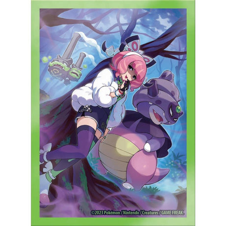 Pokémon TCG Klara Premium Tournament Collection box featuring assorted Pokémon trading cards and accessories.