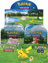 Assorted Pokémon GO Mini Tins with Pokémon trading cards displayed, featuring colorful tins and card packs from the Pokémon brand.