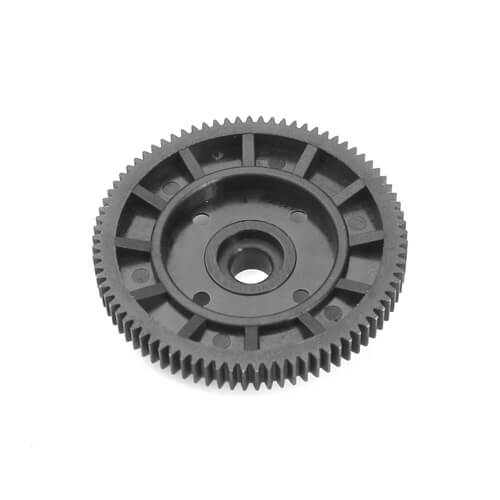 Tekno RC car spur gear 81T, 48P with metal teeth, close-up view showing gear teeth and mounting hole for TKR6522B model