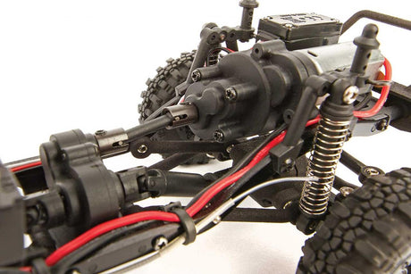 Element RC Enduro24 Sendero 1/24 RTR crawler with black and yellow body, detailed transmission and rugged design.
