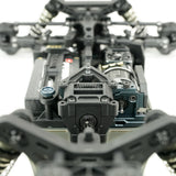 Tekno EB410.2 1/10th scale 4WD electric RC buggy kit with detailed chassis and suspension components, ready for racing.