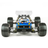 Tekno TKR7202 ET410.2 1/10th 4WD electric RC Truggy kit on a track, showcasing its sleek design and off-road tires.