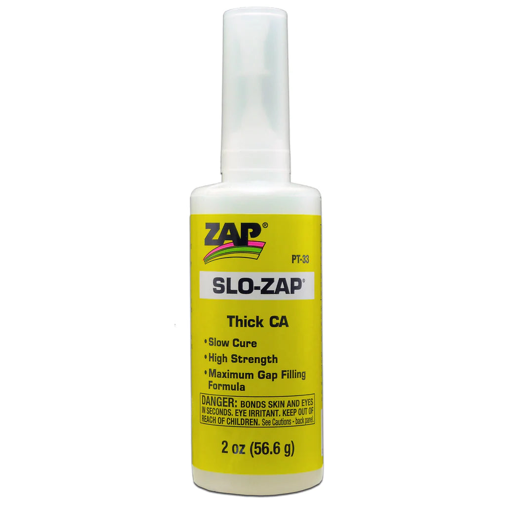 Yellow thick Zap Slo-Zap CA super glue bottle with applicator tip, designed for strong bonding and precise application.